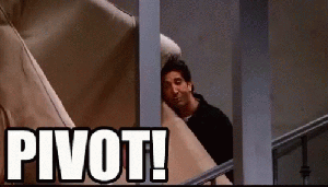 Gif of Ross Geller from Friends moving a couch up the steps and shouting, "Pivot!"